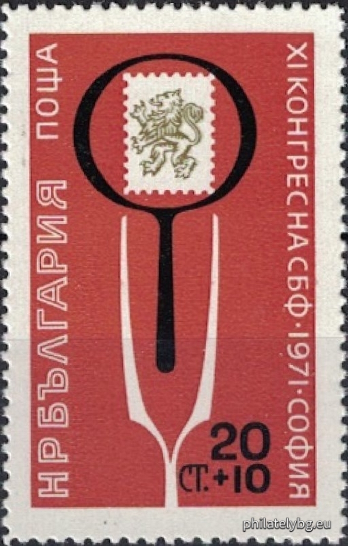 Tweezers, a magnifying glass and a postage stamp.